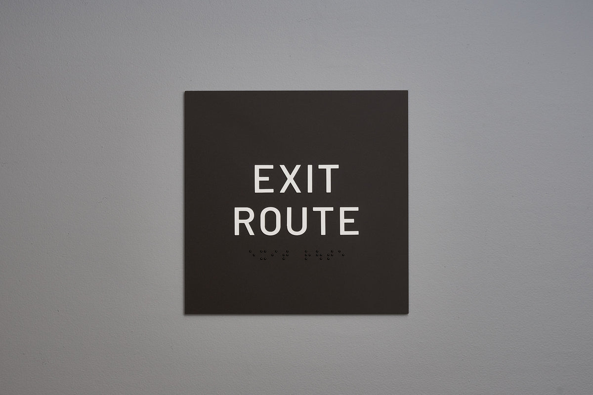 Tap Exit Rout Sign ADA Exit Route Signs by Martina & Co in Acrylic & Aluminum – Martin Sign