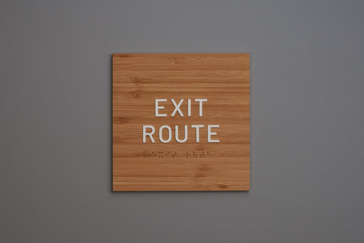 Tap Exit Rout Sign ADA Exit Route Signs by Martina & Co in Acrylic & Aluminum – Martin Sign