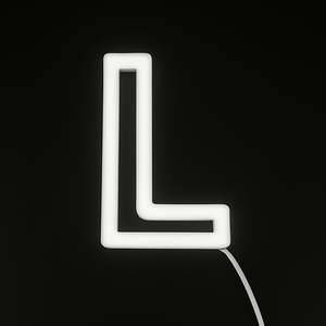 Neon letter 'L' on a black background