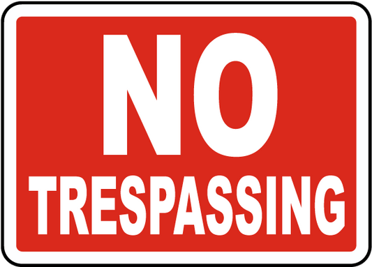 No Trespassing sign with red background