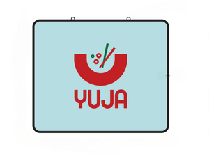Yuja logo on a light blue background