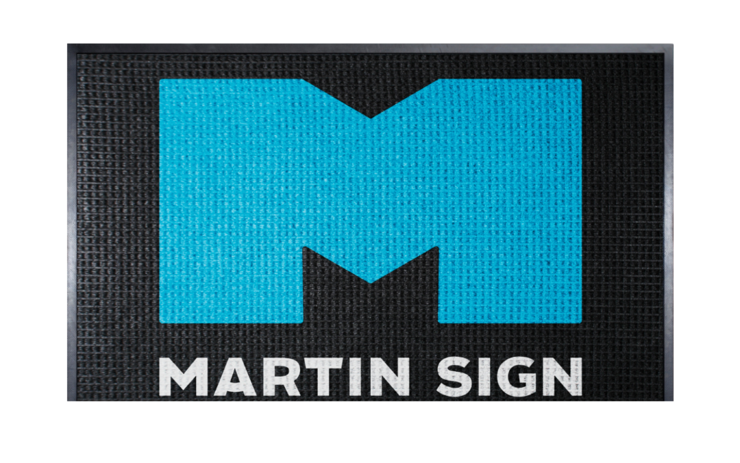 Logo of Martin Sign with a blue 'M' on a black background