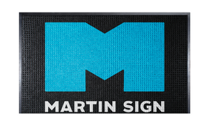 Logo of Martin Sign with a blue 'M' on a black background