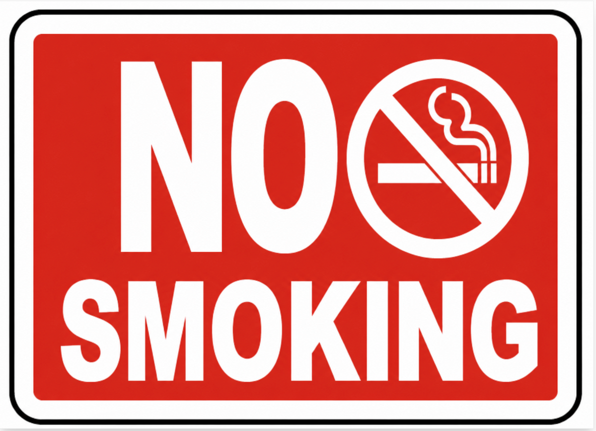 No smoking sign with red background and white text and symbol