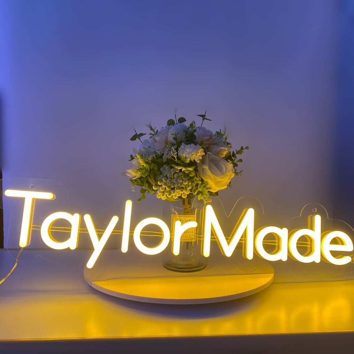glowing acrylic neon-style sign