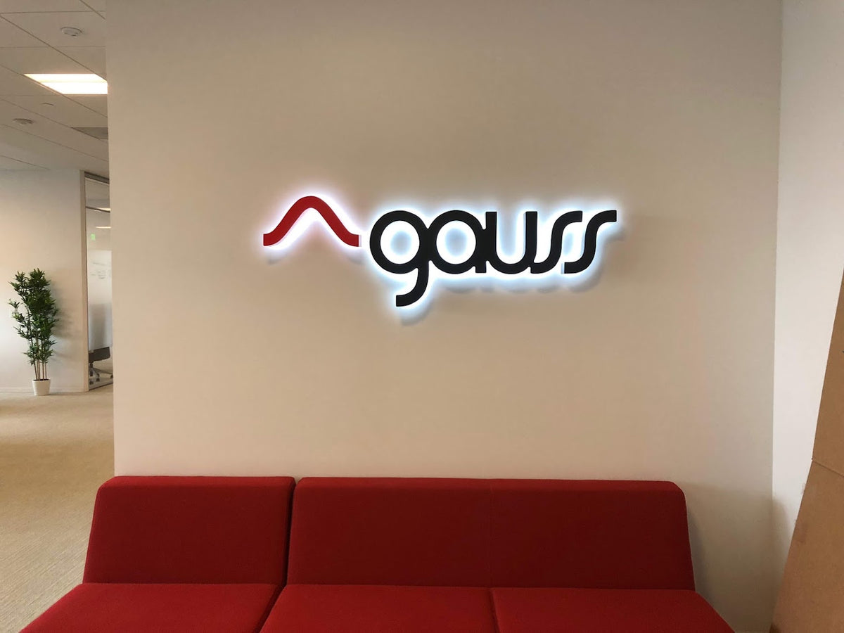 illuminated Gauss logo sign